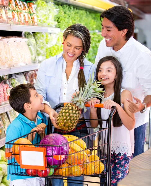 Happy family at the supermarket Happy family at the supermarket