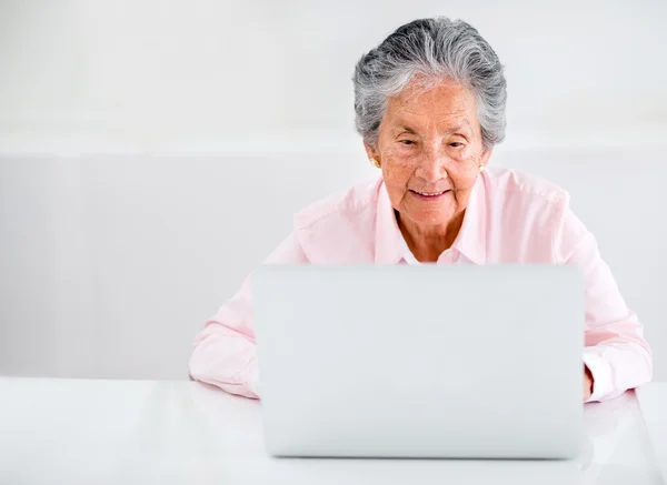 Elder woman using a laptop