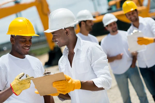 Architects working at a construction site