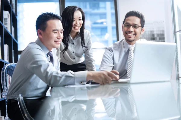 Business people using laptop for work