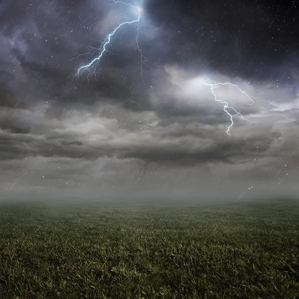 Lightning flash over a field