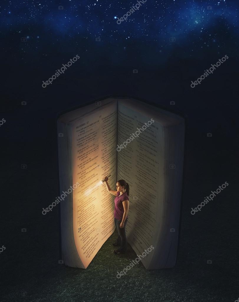 Woman reading inside a huge book ??? Stock Photo ?? kevron2002 31276125