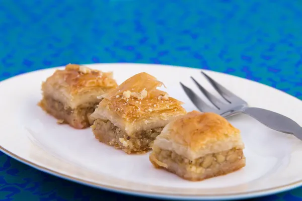 Three Pieces of Golden Color Walnut Baklava