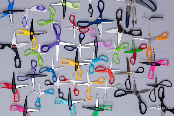 Background of multiple household scissors