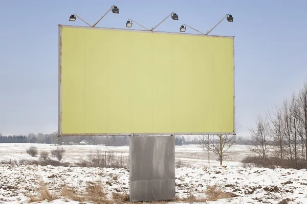 Advertising stand in a meadow on the field