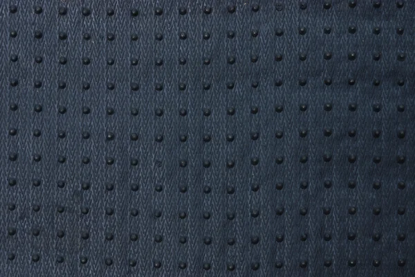 The surface of Grey car mat.