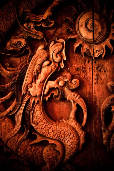 Antique wooden door, Sculpt a Dragon God.