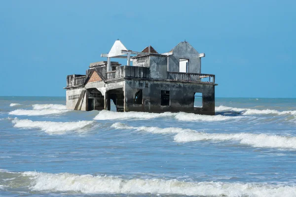 Global warming and monsoon Destroyed houses near the coast, Thai