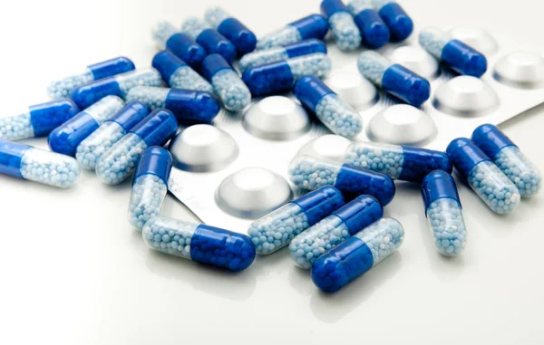 Medical pills with blue packaging