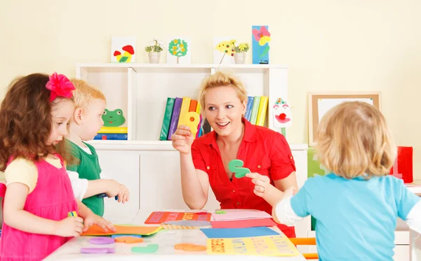 Pre-school children in the classroom with the teacher