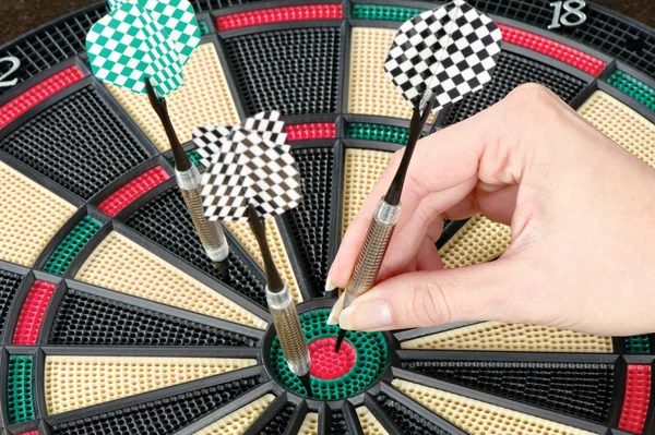 Taking out dart from dartboard