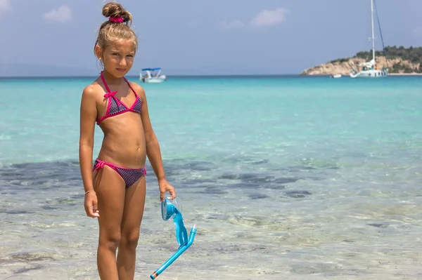 Girl with mask in the sea