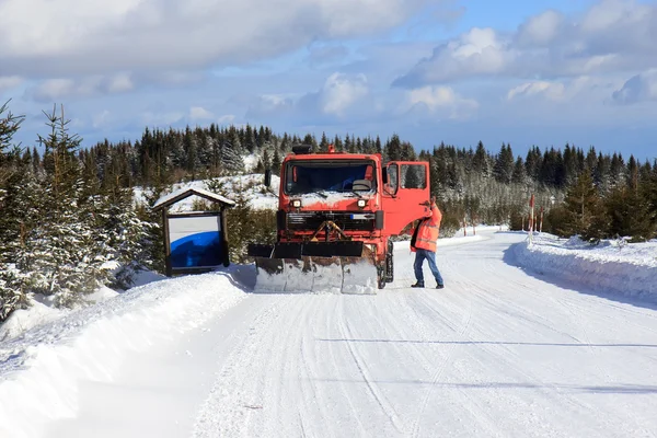 Cleaning snow from the road