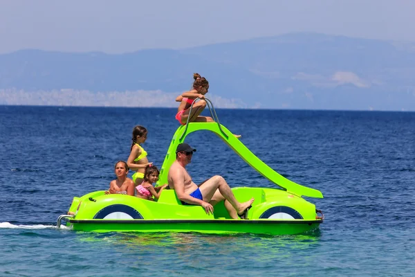 Family on the pedal boat