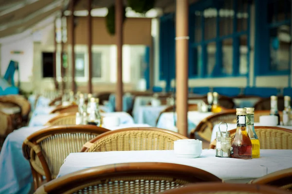 Empty tables at an outdoor restaurant