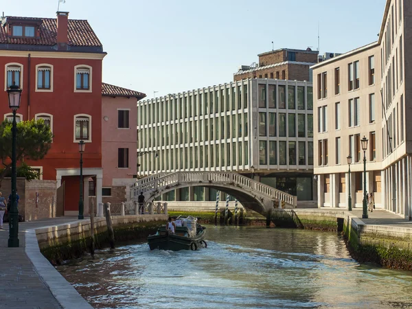 Venice, Italy . June 22, 2012 . Cargo boats carry about products on the canals of Venice