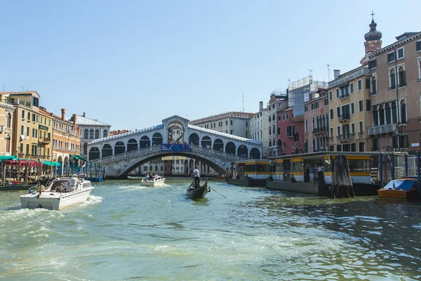 Venice, Italy. Tourists ride on a gondola through the Grand Canal