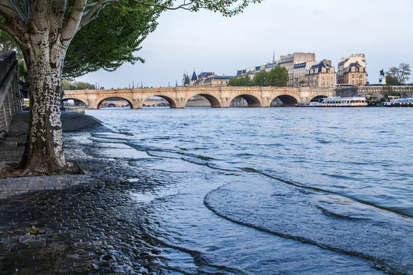 Paris, France. View of the embankment of the river Seine at sunset