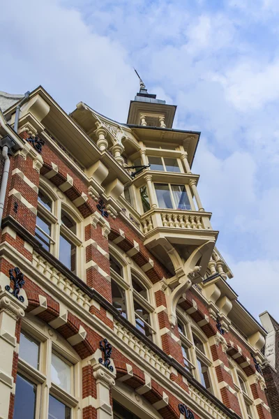 Amsterdam, the Netherlands, Typical architectural details of facades of the town houses constructed of the burned brick
