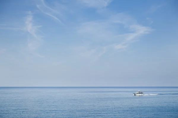 Luxury Yacht. Blue sky over water horizon. boat in the sea.