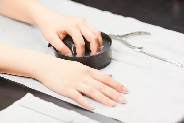 Woman at manicure