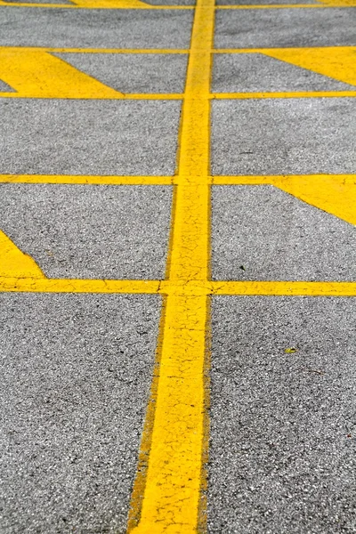 Yellow and gray road asphalt lines detail
