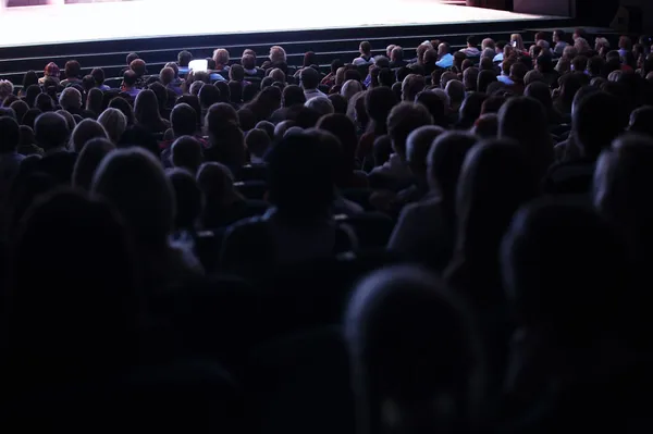 People seated in an audience