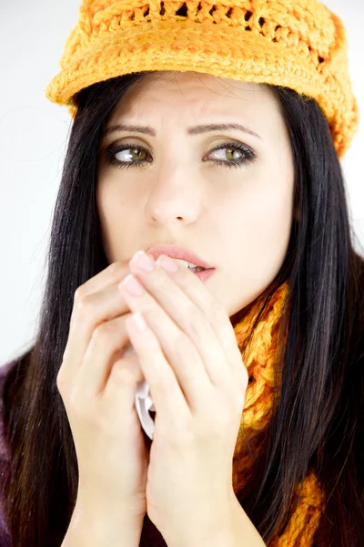Beautiful woman with cold allergy and yellow hat isolated