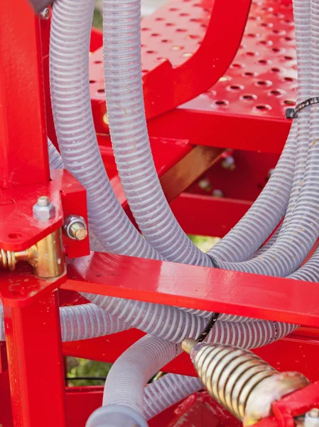 Hydraulic hose on agricultural machinery