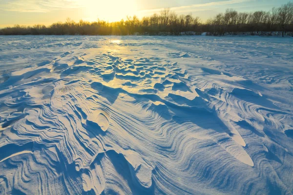 Sunset over a winter plain