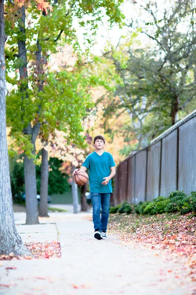 Teenage Boy in Autumn with Copy space