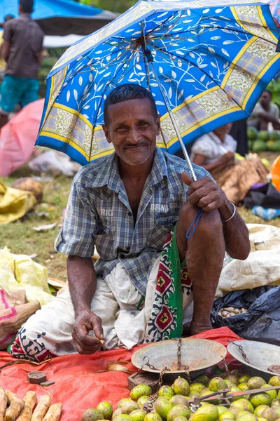 Local street vendor selling fruit