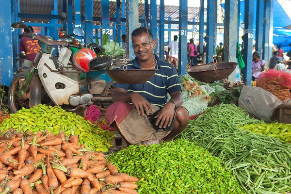 Local street vendor selling vegetables