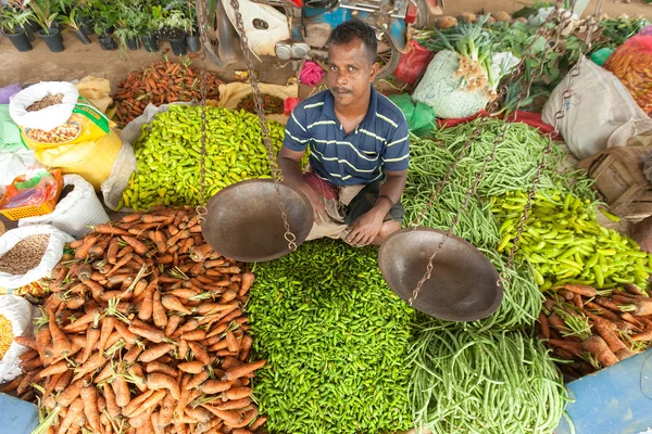 Local street vendor selling vegetables