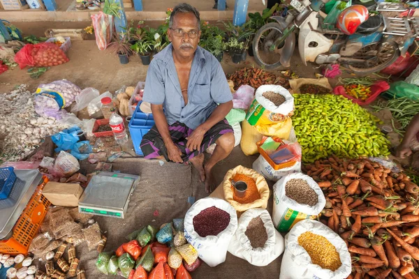 Local street vendor selling vegetables