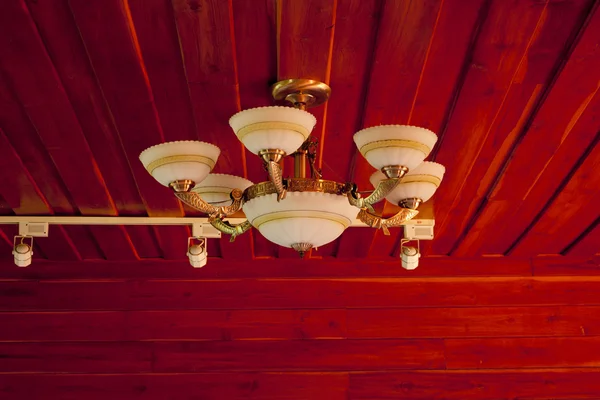 Vintage ceiling lamp fixture in dark hallway