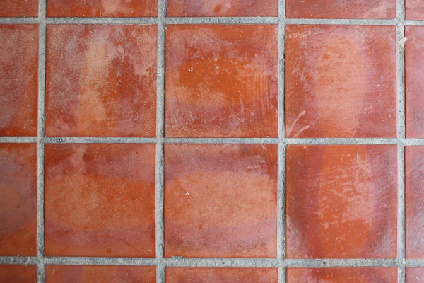 Red floor tile