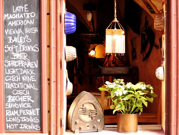 Window and menu of a cafe in the center of Prague