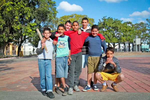 Unidentified Cuban multi-ethnic group of boys posing in Santa