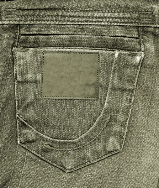 Green jeans back pocket