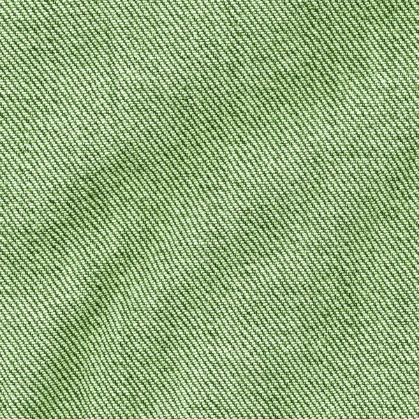 Crumpled green jeans fabric closeup