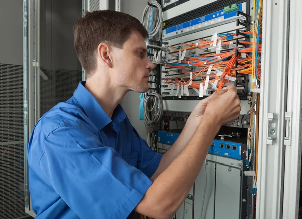 Senior Network engineer in server room