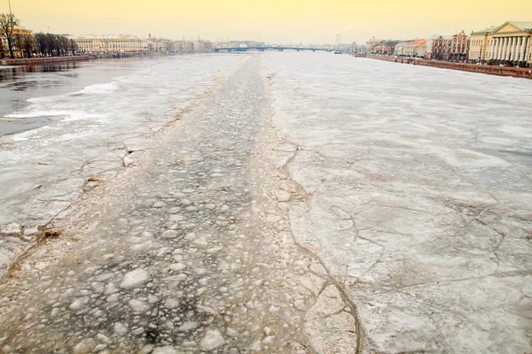 Ice-breaking opens way Neva river Palace Bridge. St.-Petersburg
