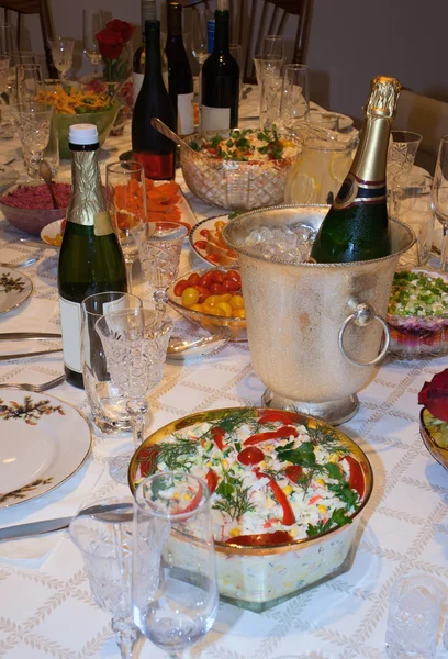Holiday table with food and wine