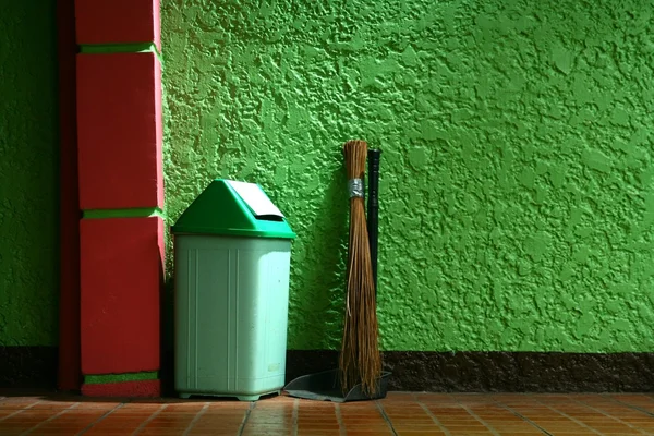 Trash bin, broom and dust pan