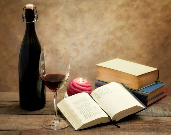 Wine glass and old novel books