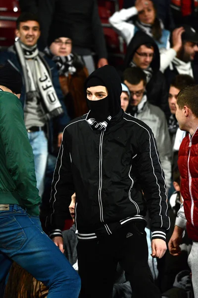 Football hooligans in a stadium