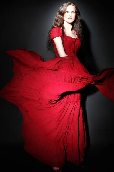 Fashion woman in red dress