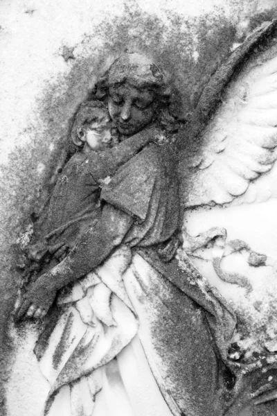 Child in angelic arms