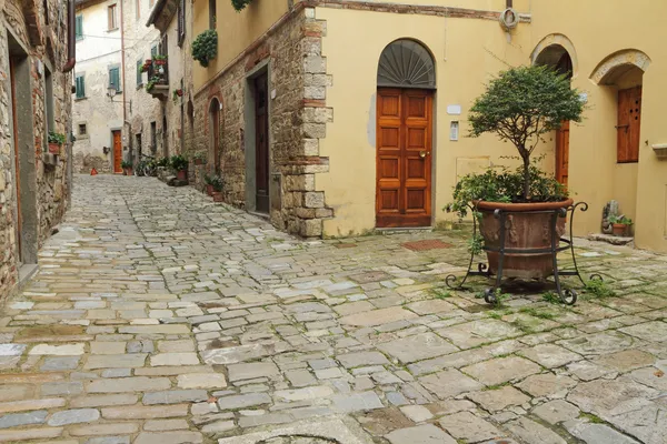 Narrow italian street and small patio